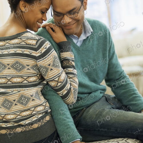 Couple relaxing at home connecting Couple relaxing at home connecting