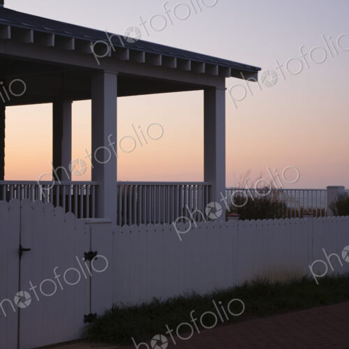 Covered Porch And Fence At Sunset Covered Porch And Fence At Sunset