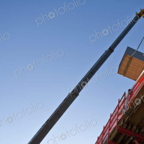 Crane Moving Material at a Work Site