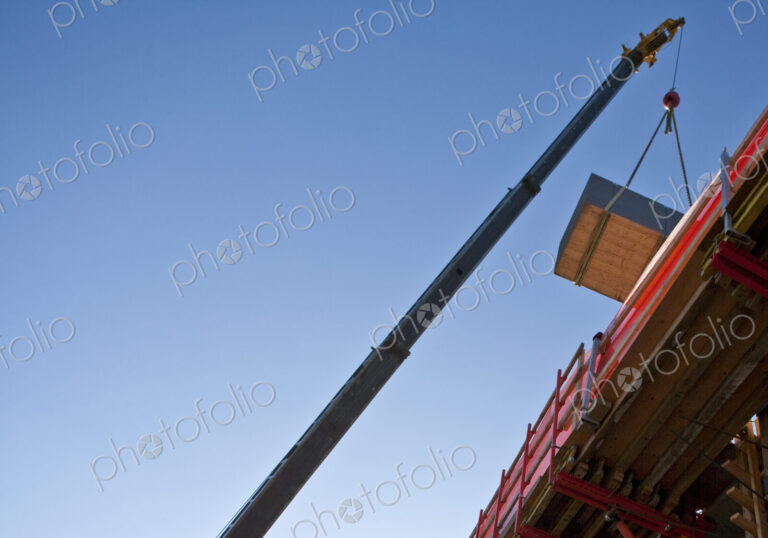 Crane Moving Material at a Work Site