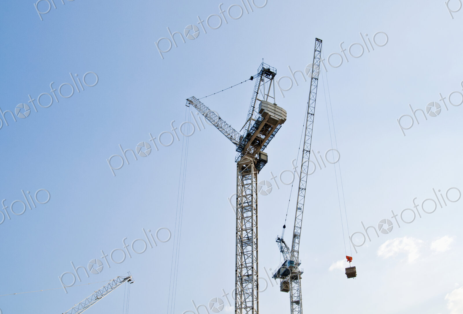 Cranes Against a Blue Sky