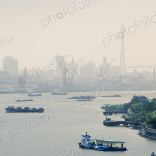 Cranes and River Traffic on Huangpu River Cranes and River Traffic on Huangpu River