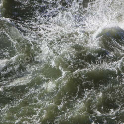 Crashing waves and ocean surf from above Crashing waves and ocean surf from above