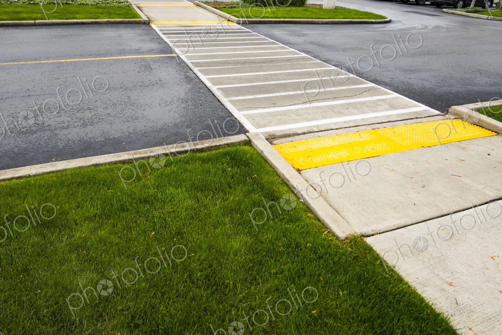 Crosswalk, a pedestrian crossing across a two lane road,