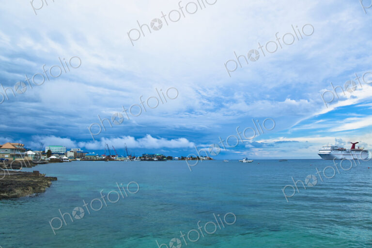 Cruise Ship Off the Shore of a Resort