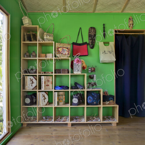 Cubby Shelving Against Green Wall