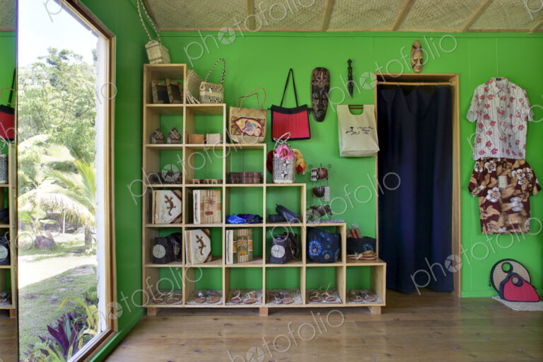 Cubby Shelving Against Green Wall