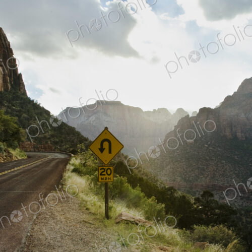 Curve Ahead Sign in Mountain Pass Curve Ahead Sign in Mountain Pass