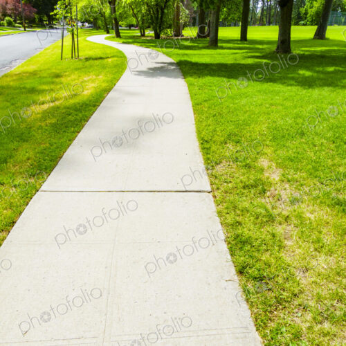 Curvy sidewalk by park, Spokane, WA USA