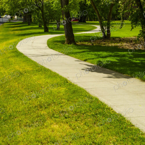 Curvy sidewalk by park, Spokane, WA USA