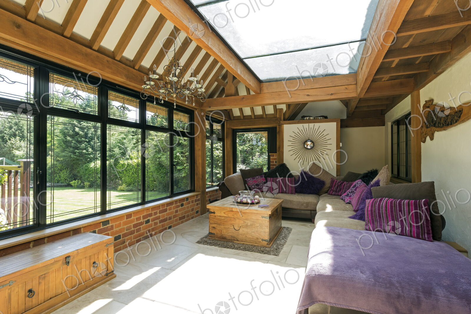 Cushioned benches in sunny conservatory