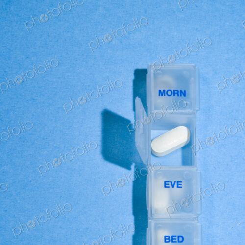 Daily Pill Container, four compartments with a one case open. Daily Pill Container, four compartments with a one case open.