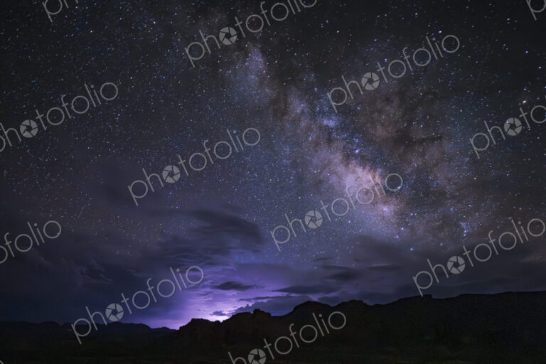 Dark skies, gathering clouds and a glow on the horizon in Texas