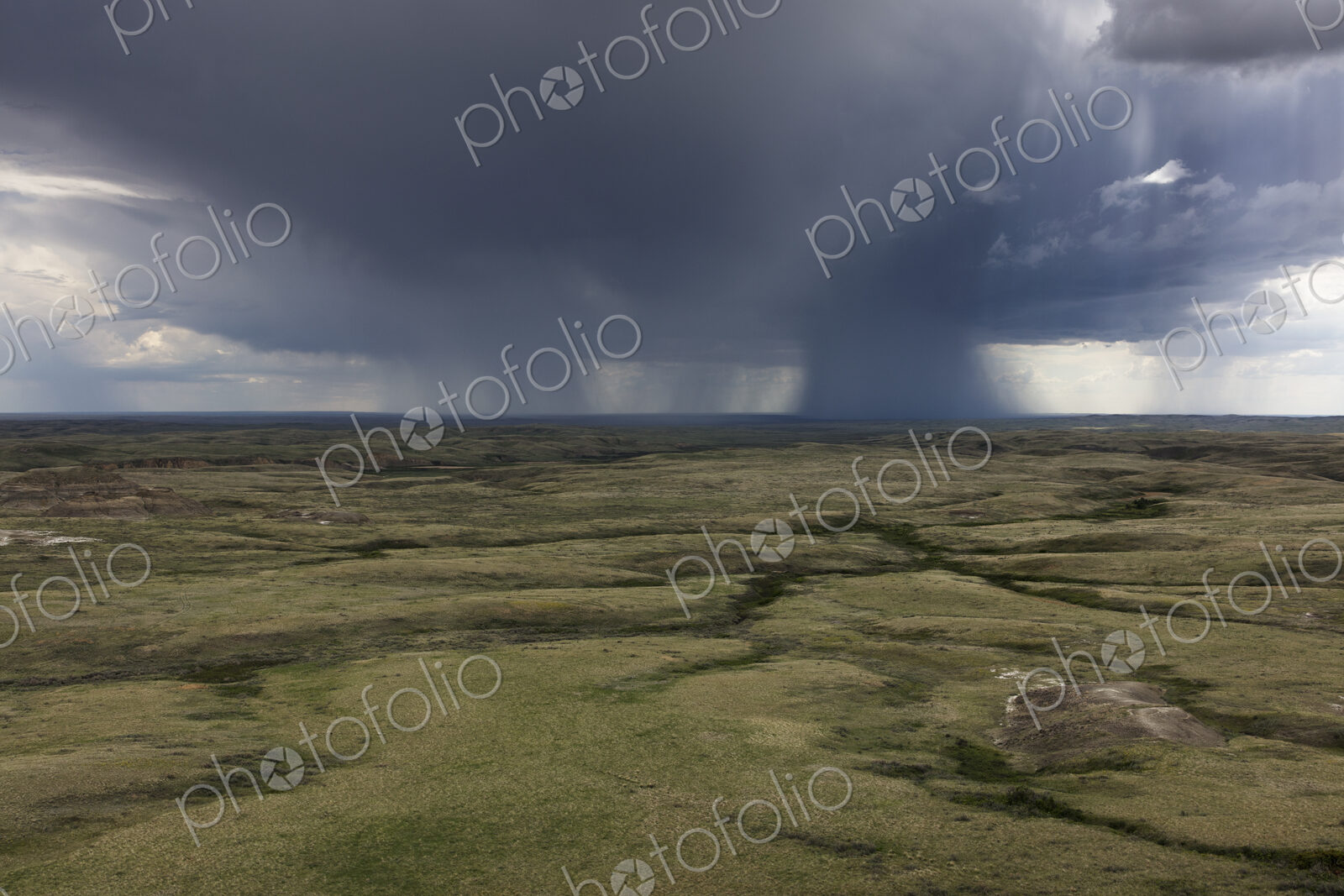 Dark storm clouds of over Grasslands National Park, Saskatchewan, Canada.