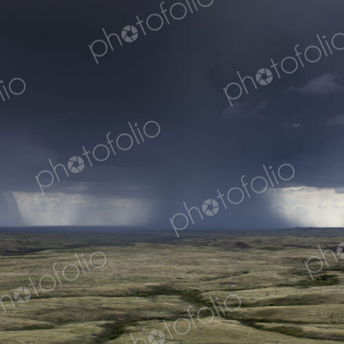 Dark storm clouds of over Grasslands National Park, Saskatchewan, Canada.