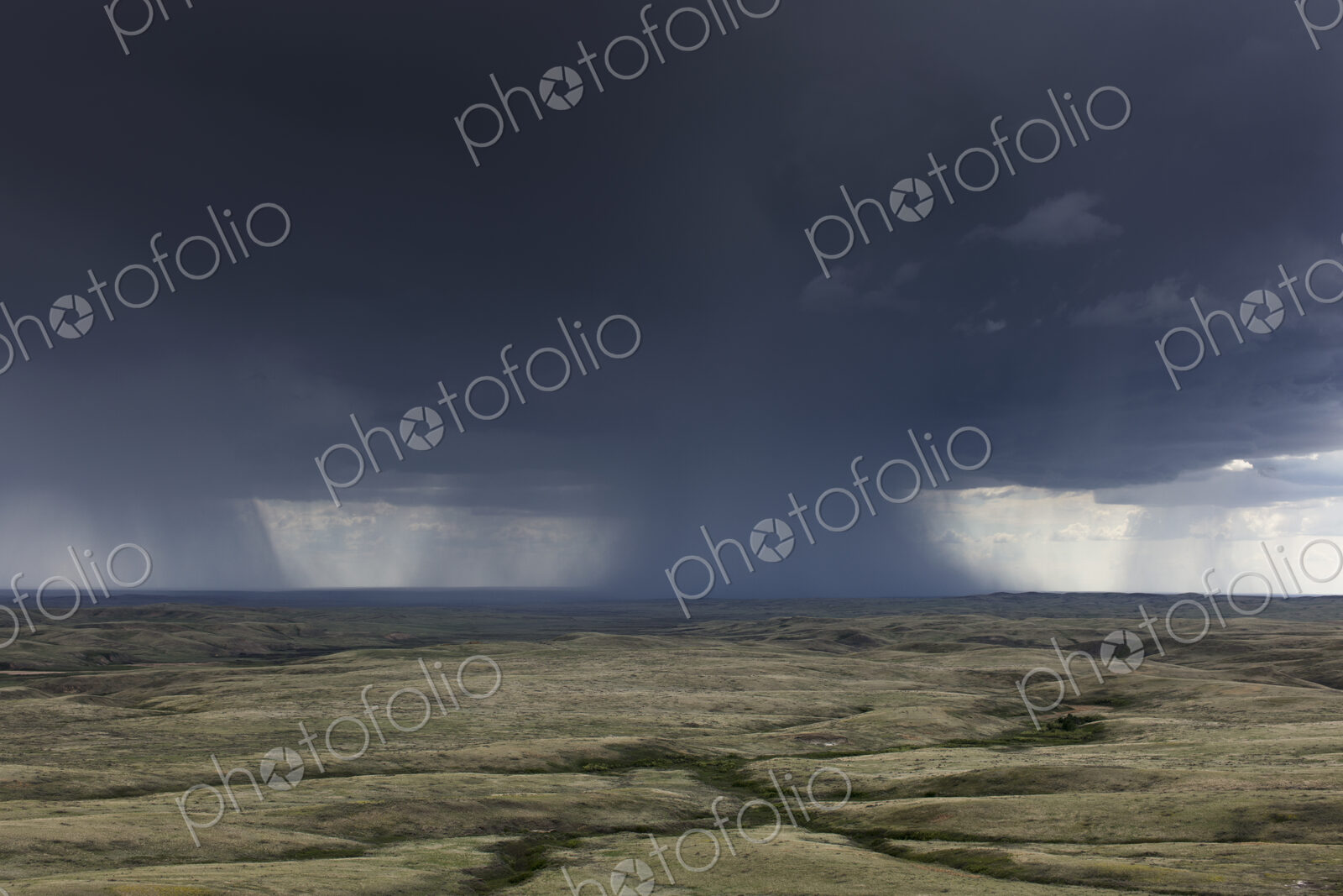Dark storm clouds of over Grasslands National Park, Saskatchewan, Canada.