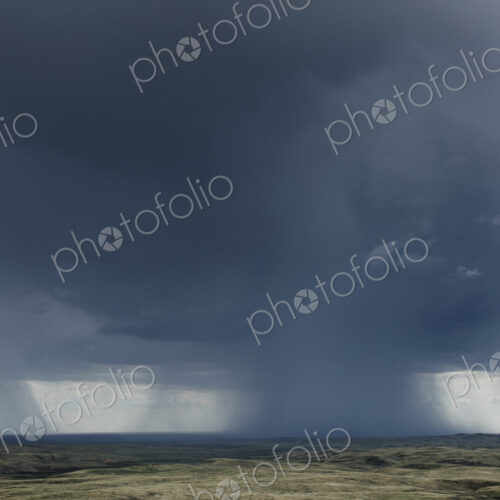Dark storm clouds of over Grasslands National Park, Saskatchewan, Canada.