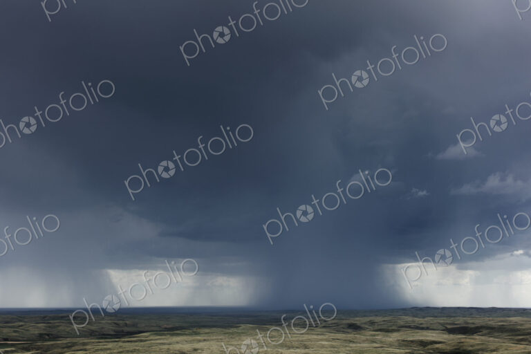 Dark storm clouds of over Grasslands National Park, Saskatchewan, Canada.