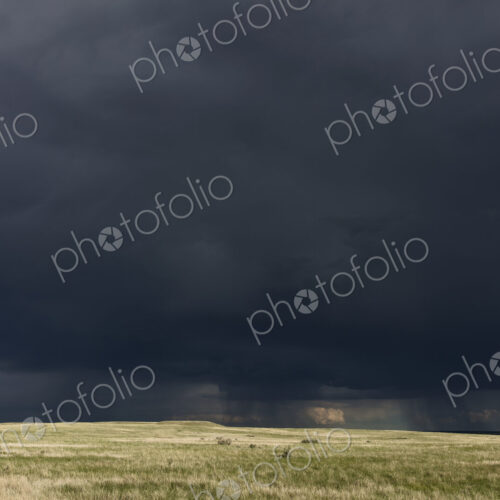 Dark storm clouds of over Grasslands National Park, Saskatchewan, Canada.