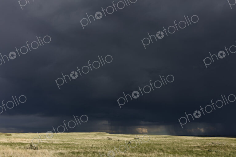 Dark storm clouds of over Grasslands National Park, Saskatchewan, Canada.