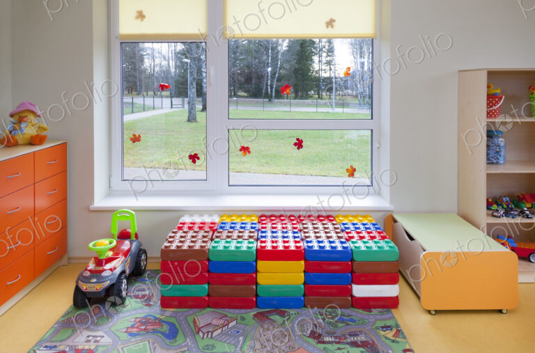 Day care nursery or pre-school kindergarten school, spacious interiors, play equipment