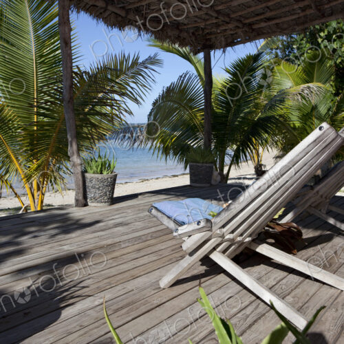 Deck Chairs On Wooden Deck