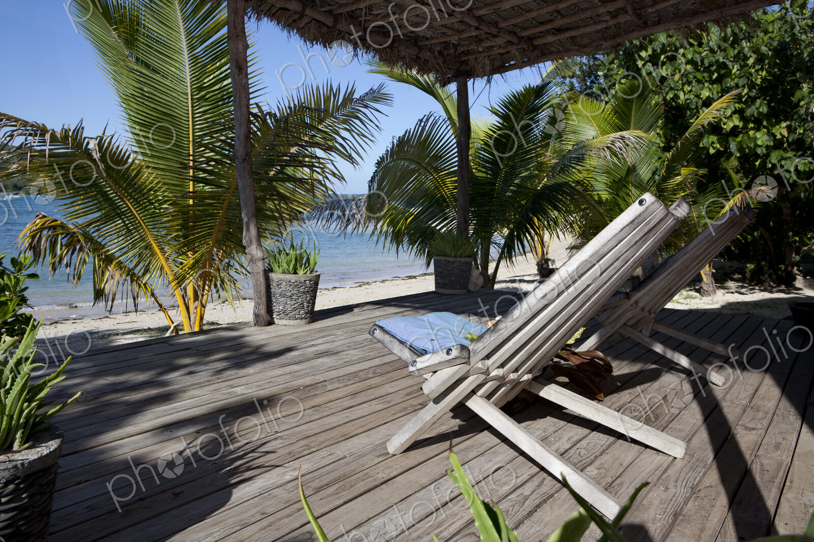 Deck Chairs On Wooden Deck