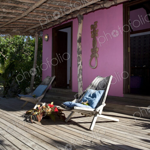 Deck Chairs On Wooden Deck