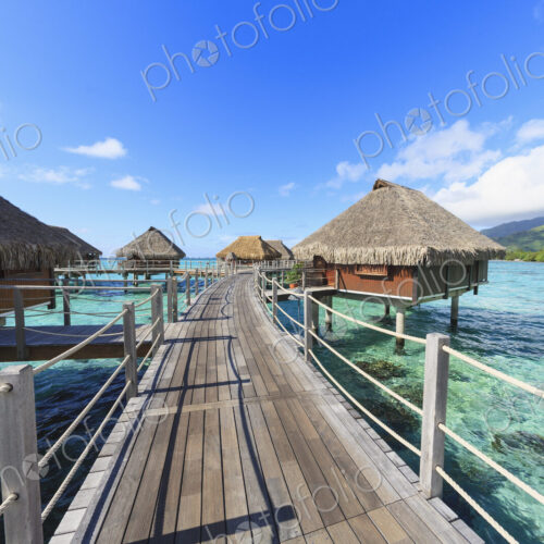 Decks connecting bungalows over tropical ocean, Bora Bora, French Polynesia Decks connecting bungalows over tropical ocean, Bora Bora, French Polynesia