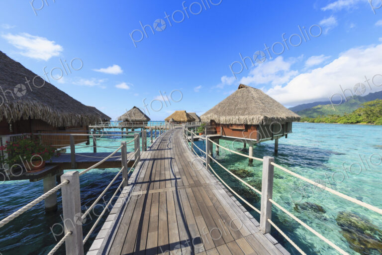 Decks connecting bungalows over tropical ocean, Bora Bora, French Polynesia