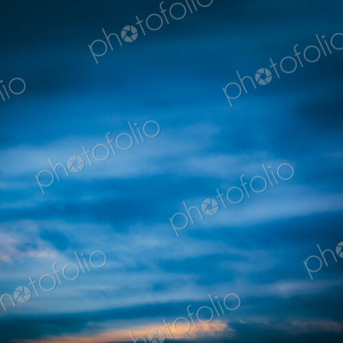 Defocussed dark clouds with sunlight clearing, Seattle, WA USA Defocussed dark clouds with sunlight clearing, Seattle, WA USA