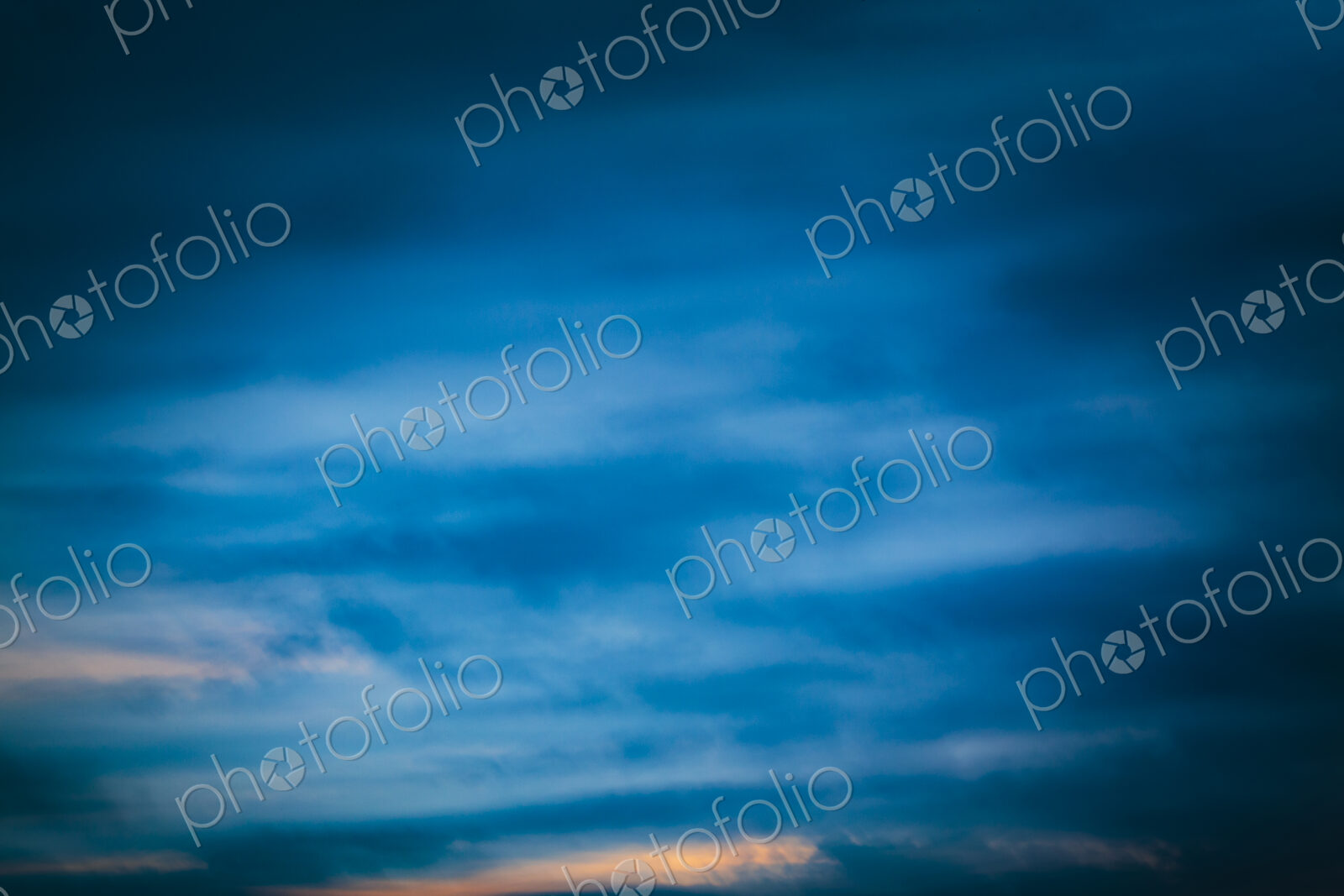 Defocussed dark clouds with sunlight clearing, Seattle, WA USA