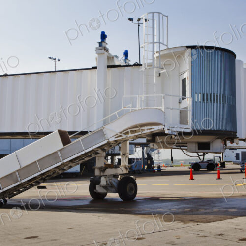 Departure airbridges, passenger boarding tunnels at an airport.