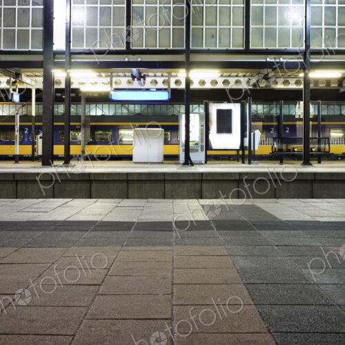 Deserted train station in The Hague at night.