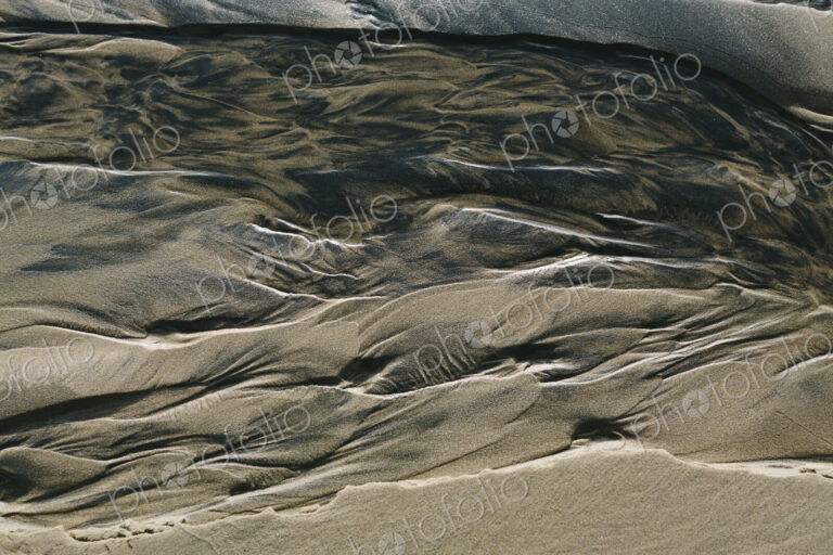 Detail of beach sand and patterns at low tide, Arcadia Beach State Park, Oregon