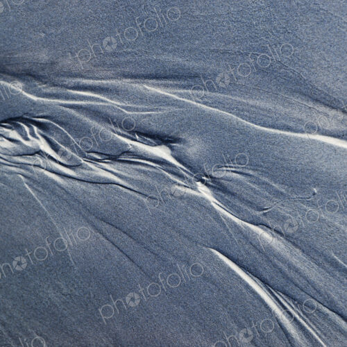 Detail of beach sand and patterns at low tide, Arcadia Beach State Park, Oregon