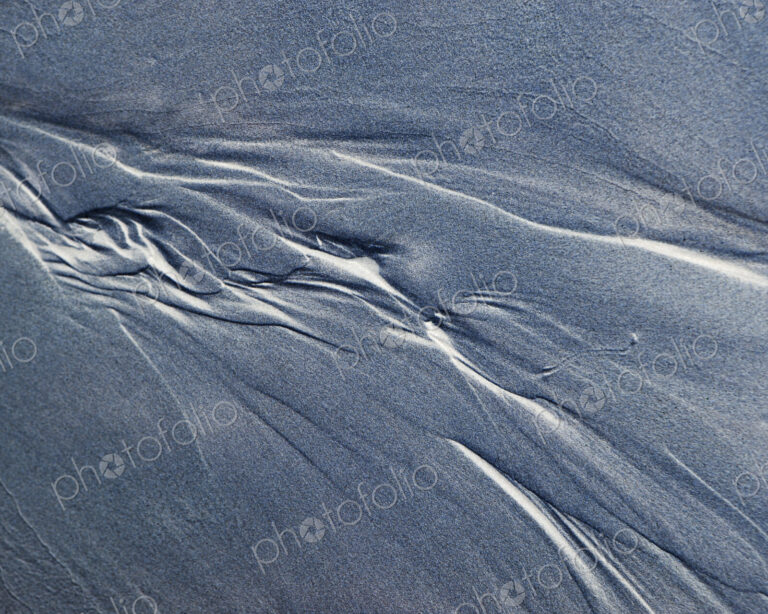 Detail of beach sand and patterns at low tide, Arcadia Beach State Park, Oregon