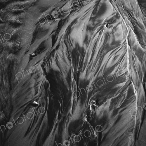 Detail of beach sand and patterns at low tide, Arcadia Beach State Park, Oregon Detail of beach sand and patterns at low tide, Arcadia Beach State Park, Oregon