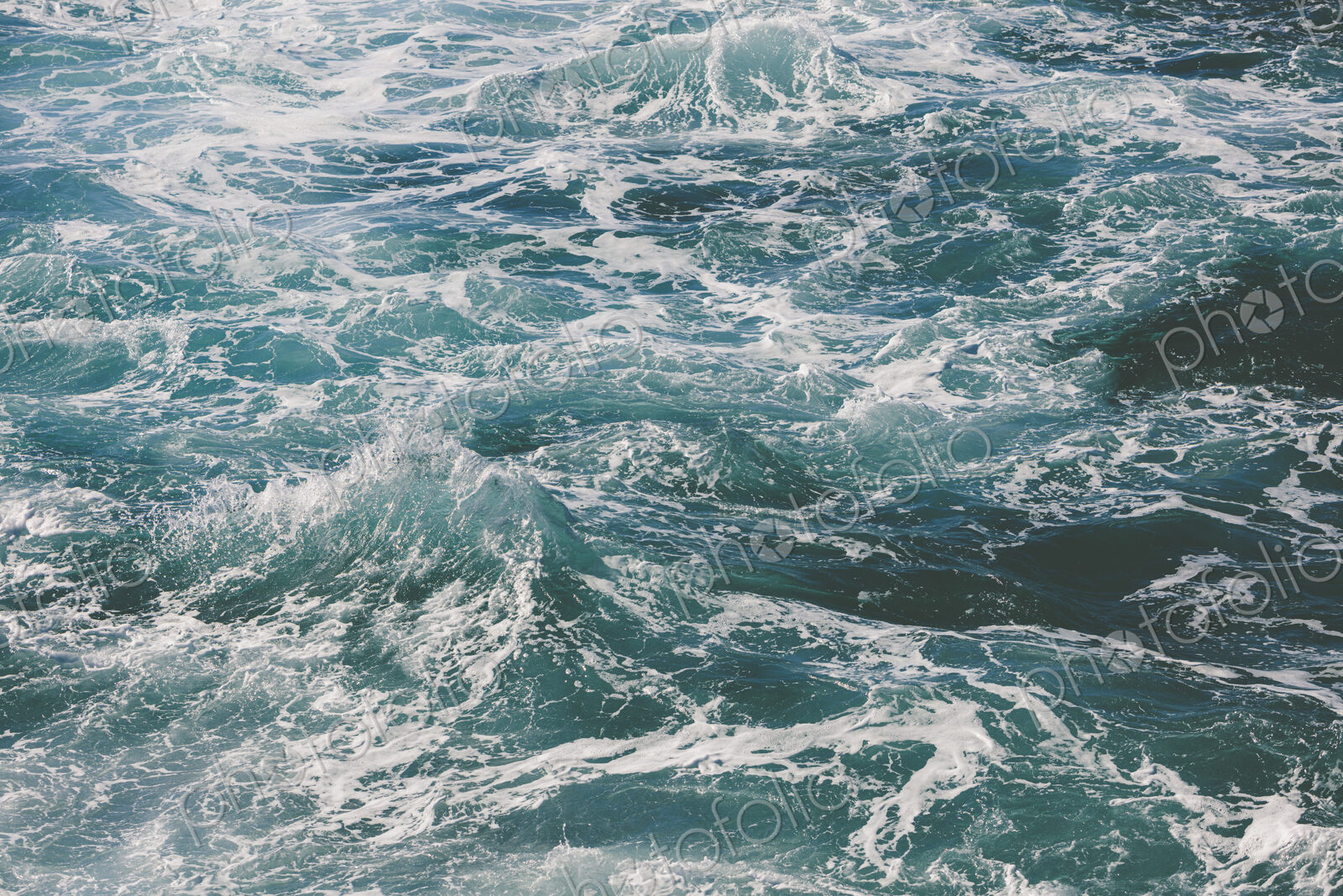 Detail of churning ocean water and waves, Big Sur, California