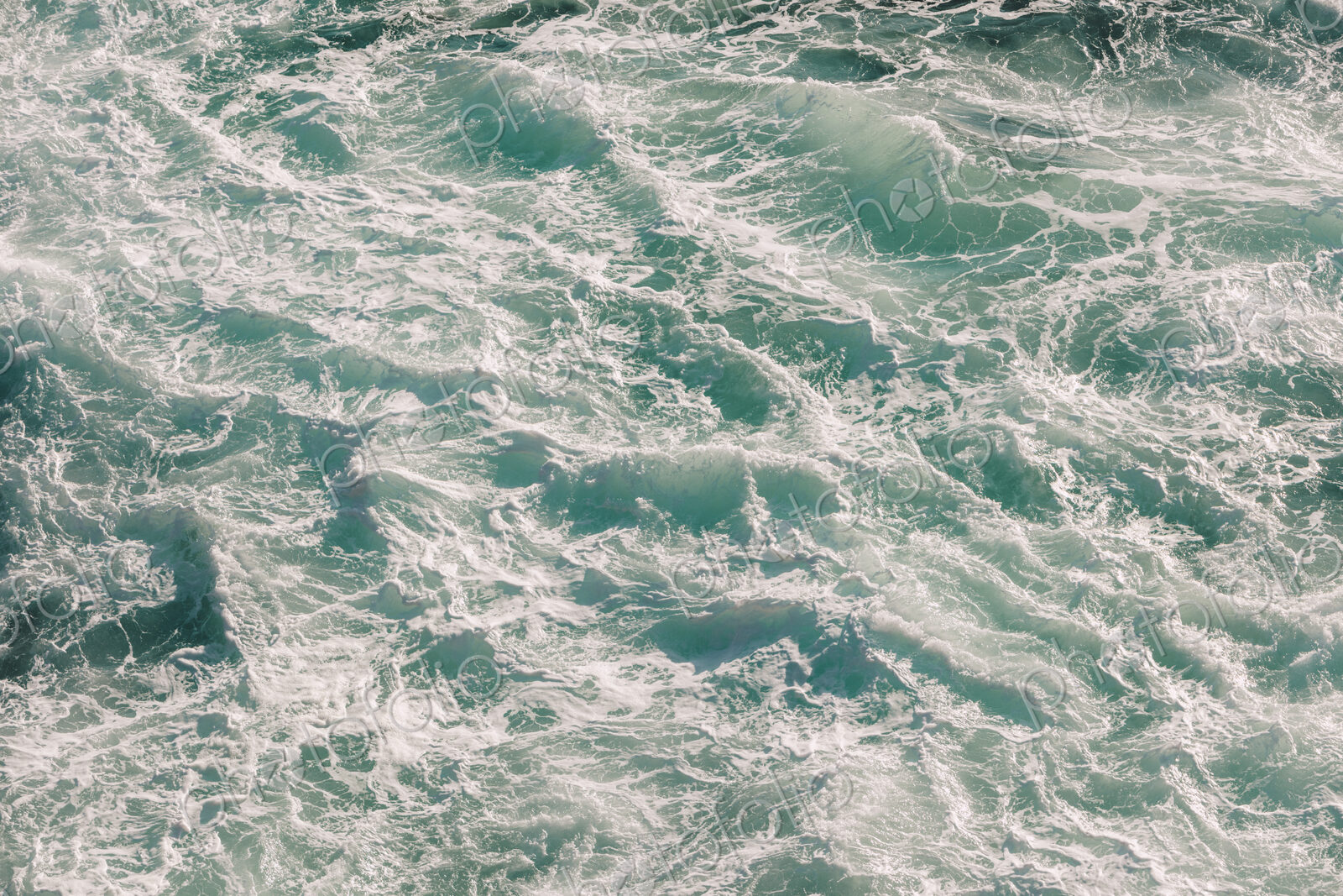 Detail of churning ocean water and waves, Big Sur, California