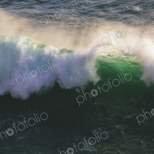 Detail of crashing waves, surf and crest, windblown mist curling from the white water,… Detail of crashing waves, surf and crest, windblown mist curling from the white water,…