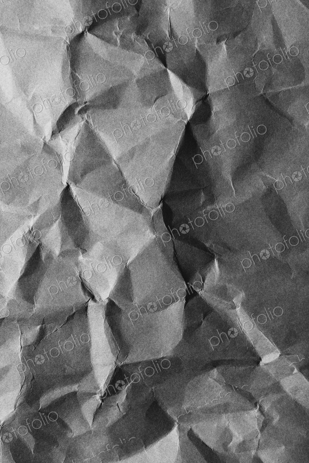 Detail of creased and wrinkled paper, close up