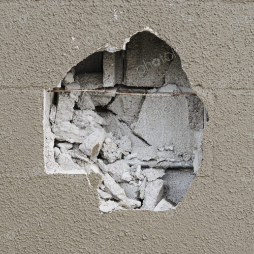 Detail of damaged concrete building wall Detail of damaged concrete building wall