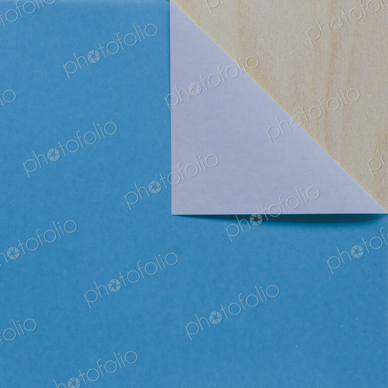 Detail of folded blue origami paper