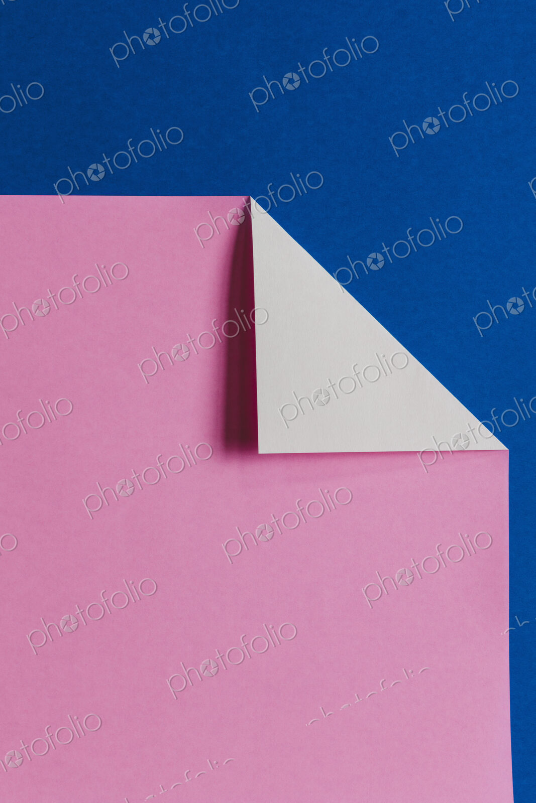 Detail of folded pink & blue origami paper