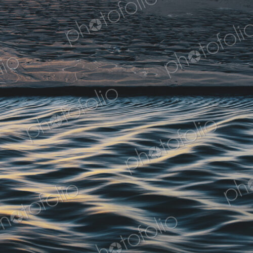 Detail of sunlight reflecting on small waves from flowing stream, Arcadia Beach State Park Detail of sunlight reflecting on small waves from flowing stream, Arcadia Beach State Park