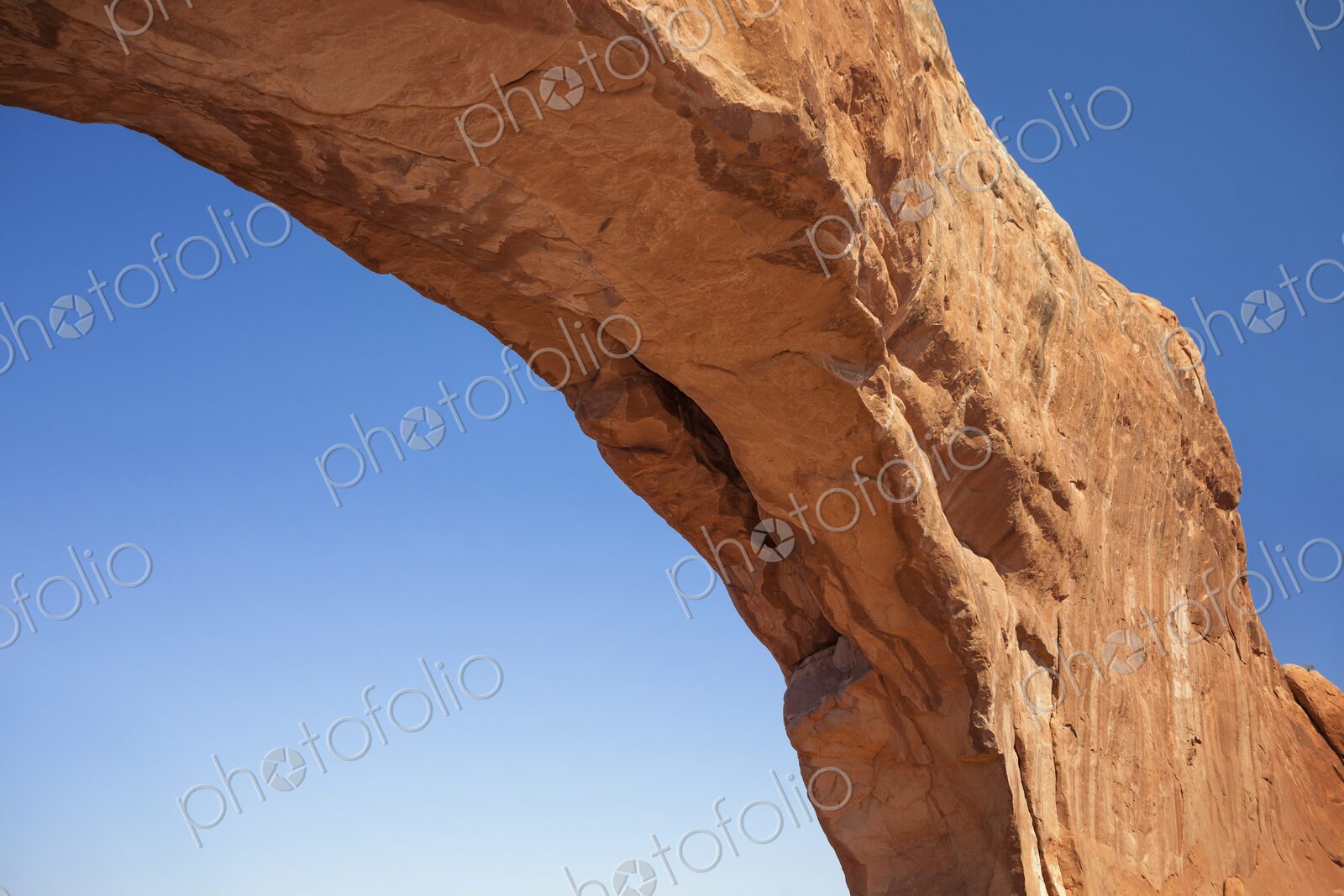 Detailed view of North Window Arch in Arches National Park, Utah, showcasing its…