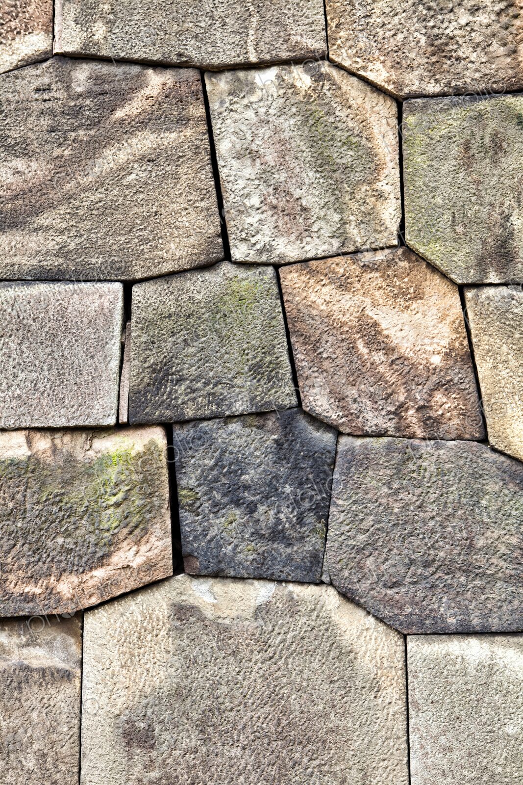 Details of the carved stone wall surrounding the Imperial Palace, Tokyo, Japan
