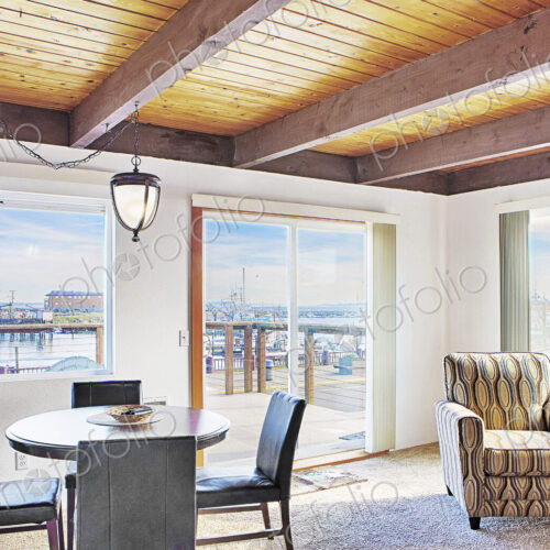 Dining table and armchair in modern living room Dining table and armchair in modern living room