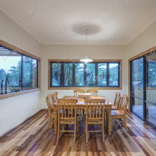 Dining table and chairs in hotel dining room Dining table and chairs in hotel dining room